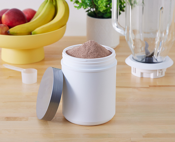 protein powder in wide mouth canister