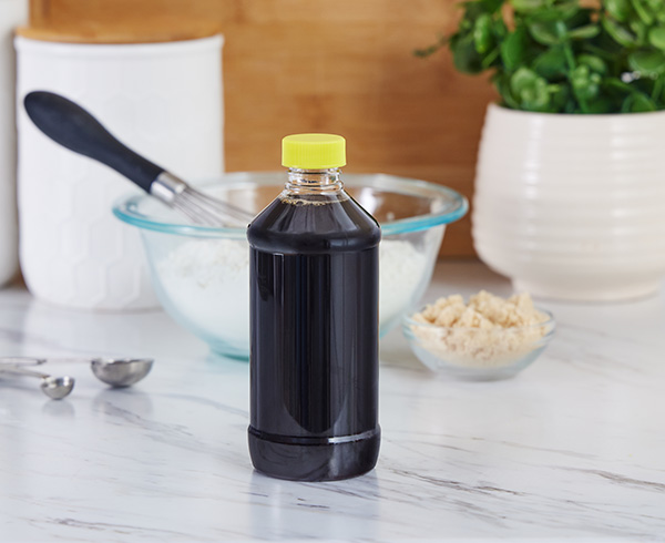8 oz modern round bottle with extract in it